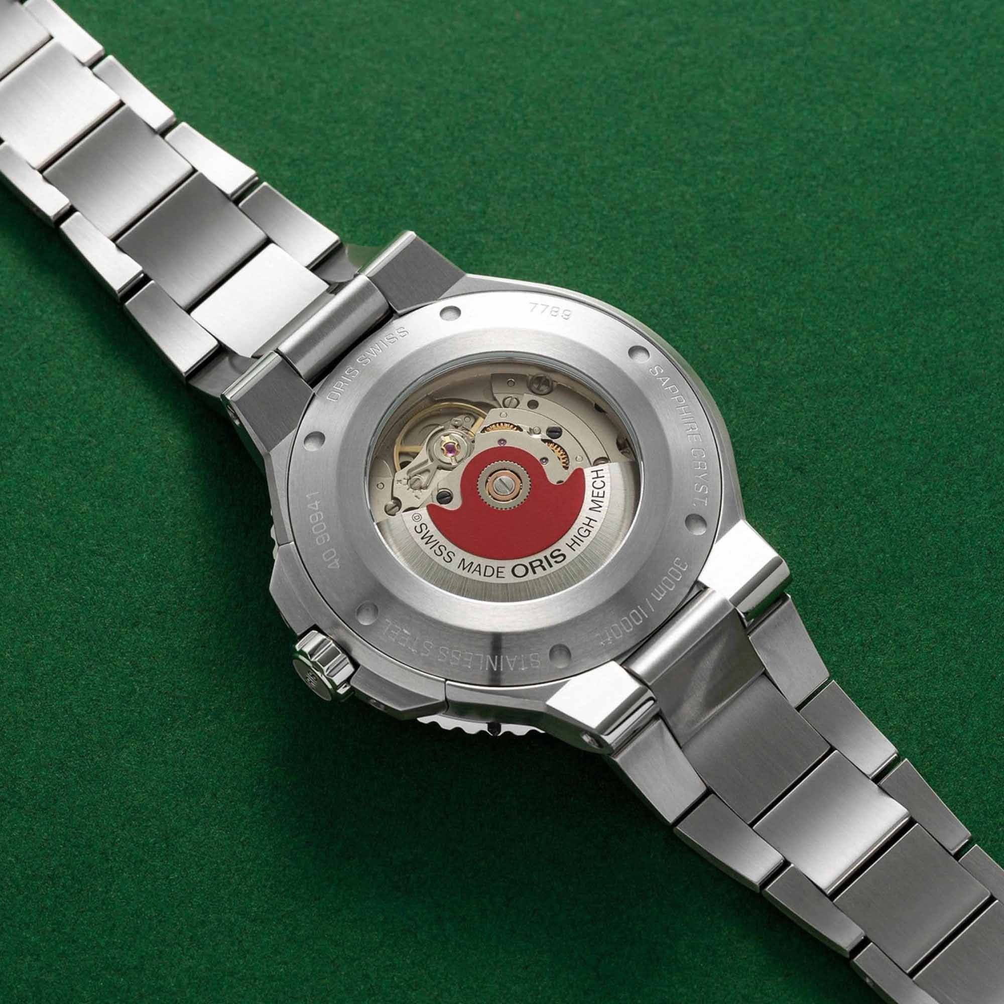 Oris Oris Aquis Date 01 733 7789 4157-07 8 23 04PEB, aquis швейцария мужские часы на браслете нержавеющая сталь боковой вид